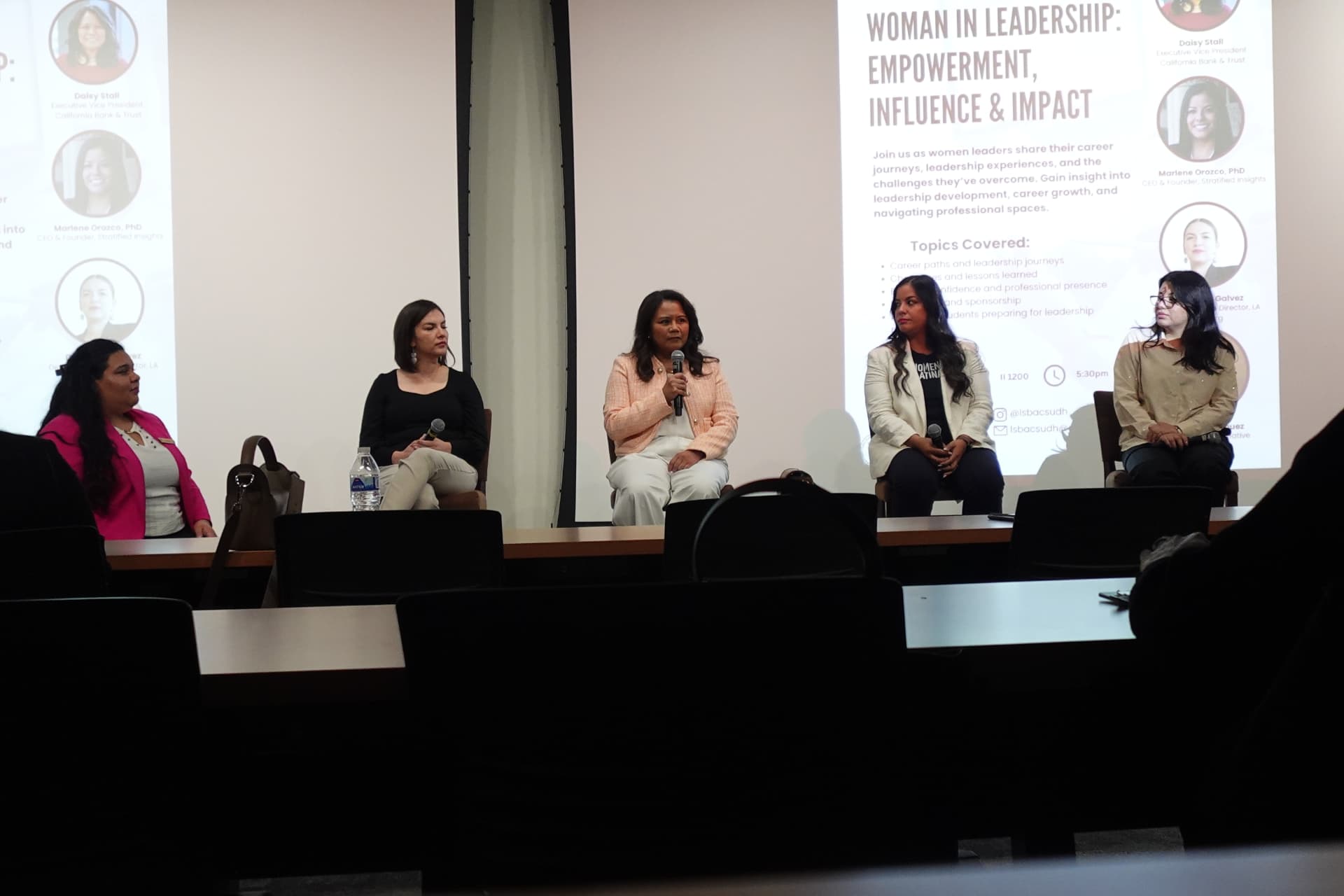 Five women panelists seated on stage during the LSBA Women in Leadership: Empowerment, Influence & Impact panel.